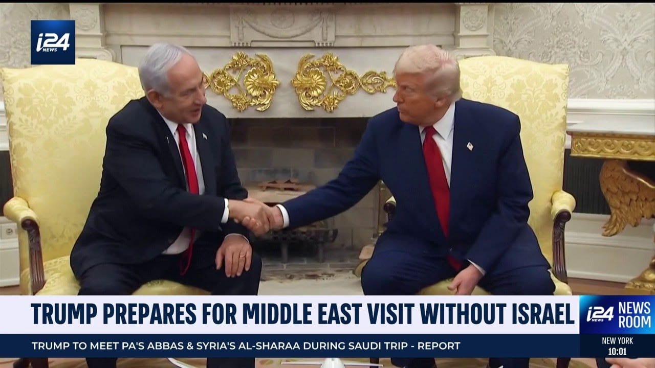 Trump walking with officials in Middle East