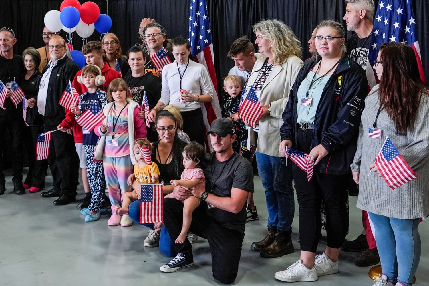 White South Africans holding signs for Trump